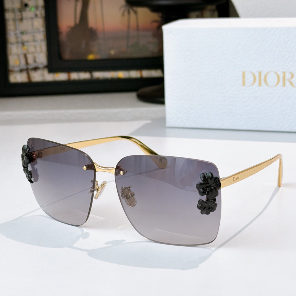 Dior oversized square sunglasses with dark lenses and dark flower frame accents