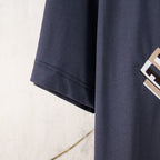 Dark blue short-sleeve T-shirt sleeve hem with visible stitching