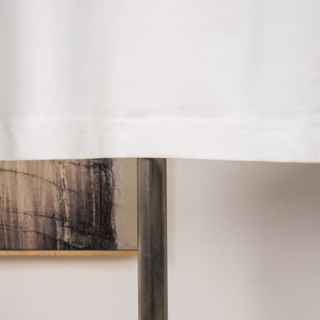 White Fendi T-shirt lower hem on display stand