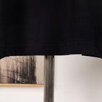 Black Dior T-shirt bottom hem seam detail