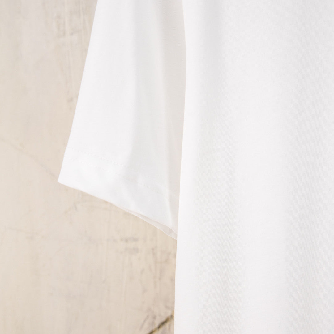 White Dior T-shirt side view with straight hem and short sleeve