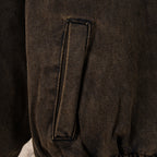 Jacket sleeve with vertical welt pocket