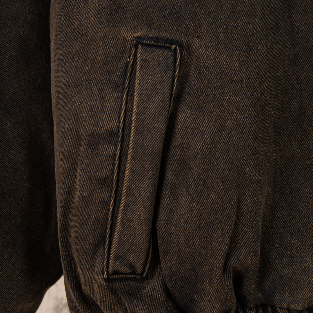 Jacket sleeve with vertical welt pocket