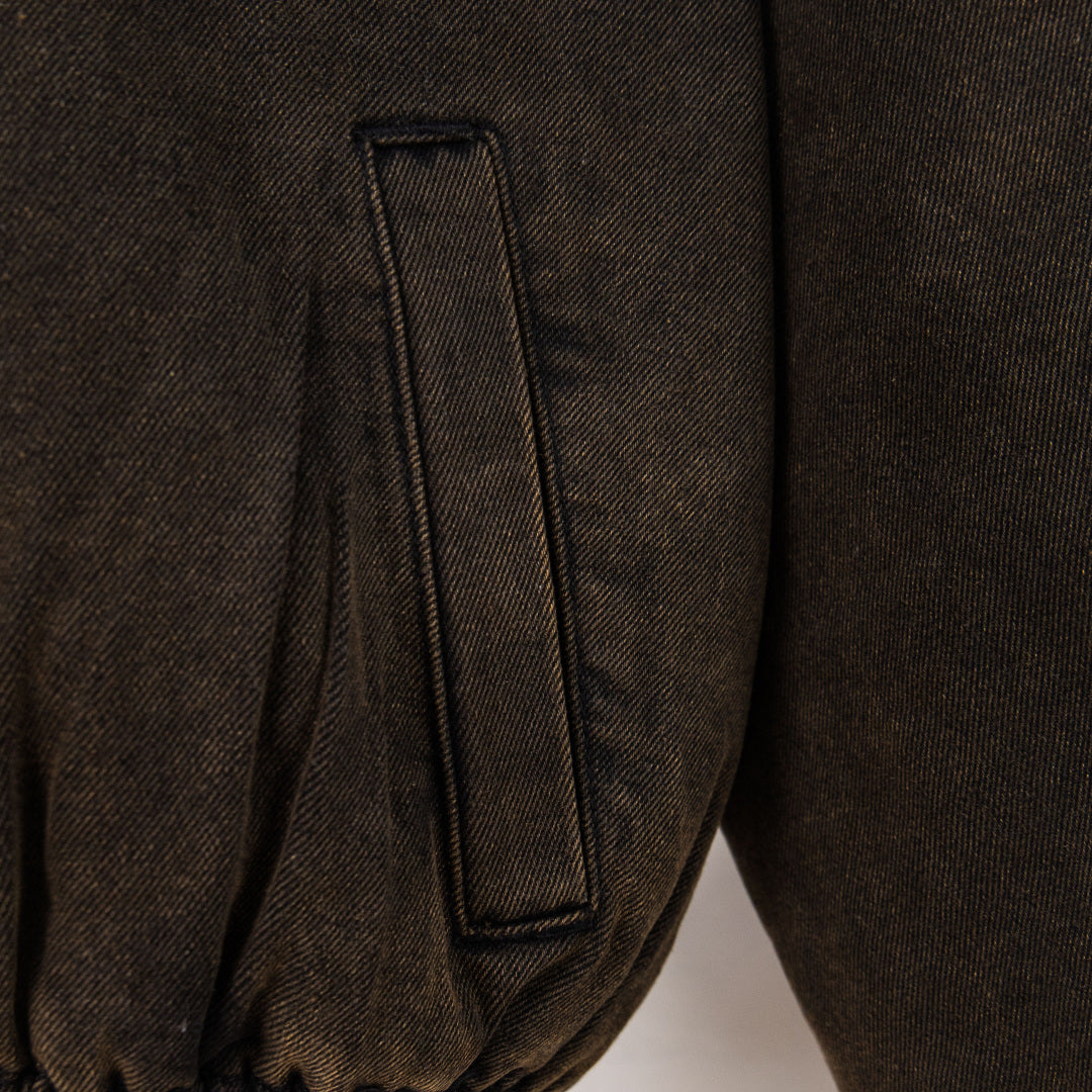Jacket pocket panel with vertical welt pocket stitching