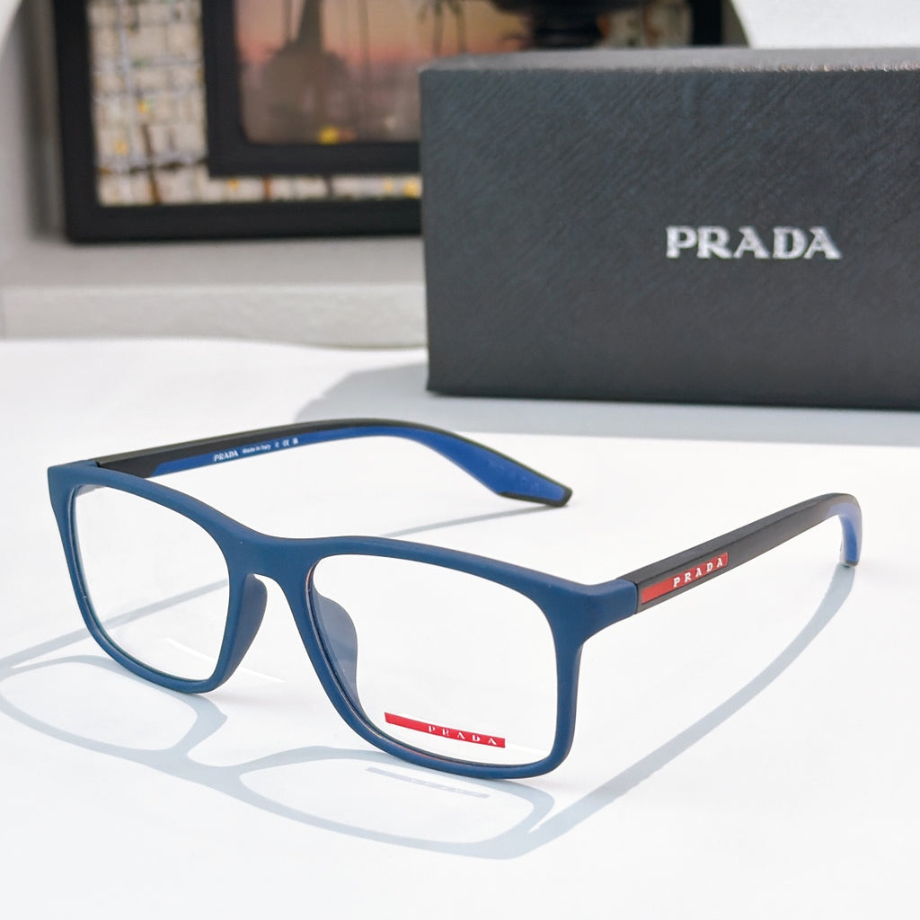 Prada glasses with blue rectangular frames, clear lenses and PRADA logo on temples