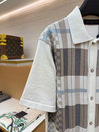 Louis Vuitton short-sleeve shirt with white collar and blue-gray plaid front panel