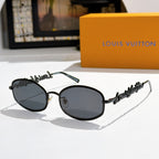 Louis Vuitton sunglasses, black frame with dark gray lenses
