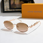 Louis Vuitton sunglasses, light gold frame with beige gradient lenses