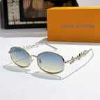 Louis Vuitton sunglasses, silver frame with light blue gradient lenses