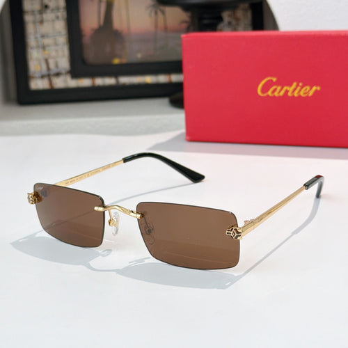 Cartier sunglasses with brown gradient lenses and gold-tone metal frame