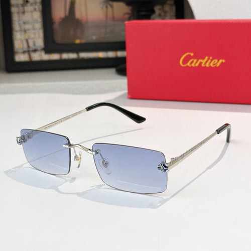 Cartier sunglasses with light blue lenses and gold-tone metal frame