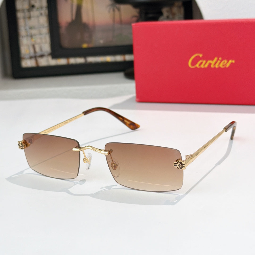 Cartier sunglasses with tan gradient lenses and gold-tone metal frame, tortoise temples
