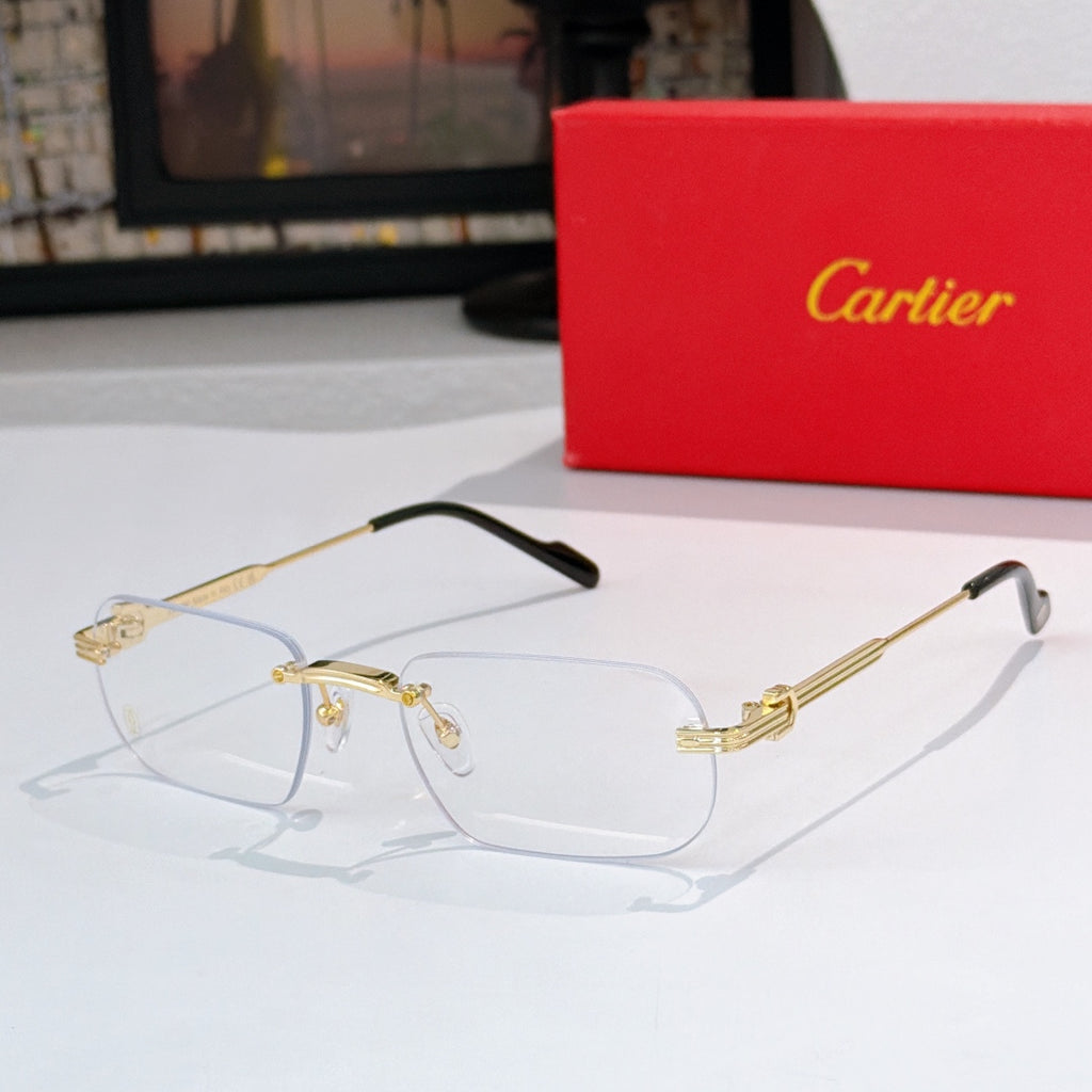 Gold-rimmed eyeglasses with clear lenses and black-tipped arms, metal hinges