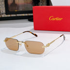 Gold-rimmed sunglasses with tan lenses and tortoiseshell arms, metal hinges