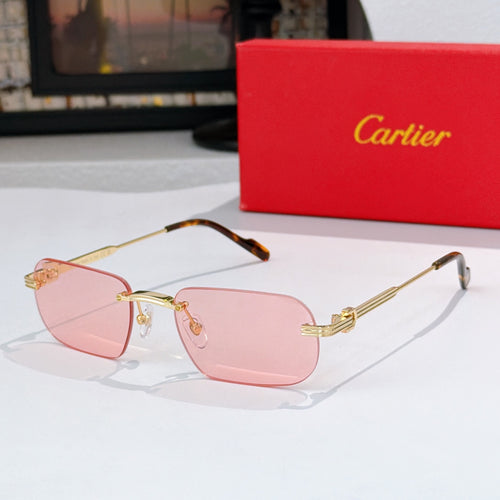Gold-rimmed sunglasses with pale pink lenses and tortoiseshell arms, metal hinges