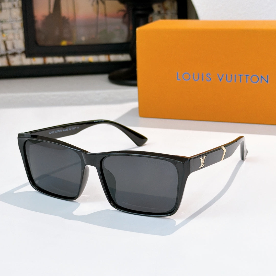 Black square-frame sunglasses with dark lenses and gold logo on temple