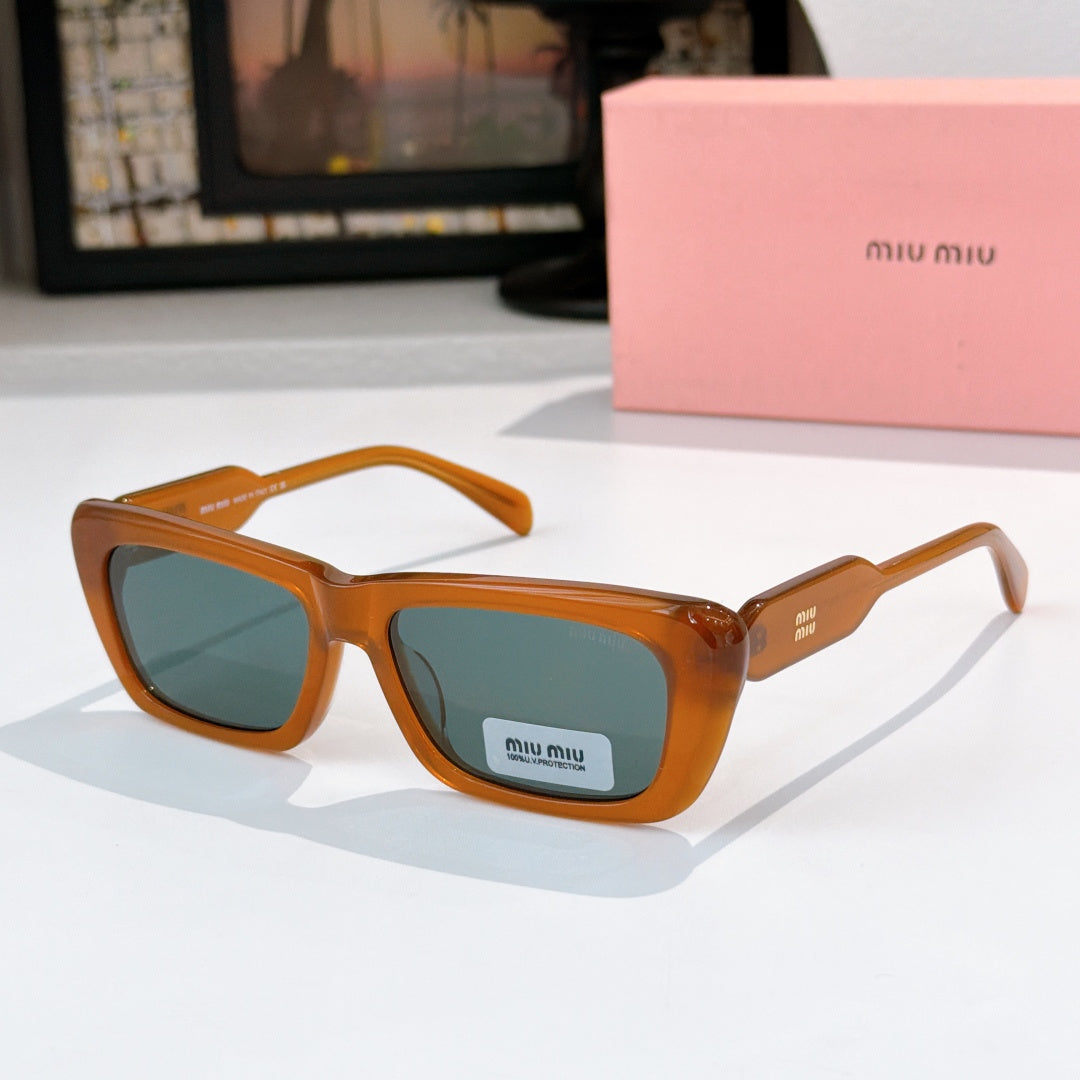 Orange rectangular eyeglasses with teal-tinted lenses