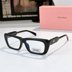 Black rectangular eyeglasses with blue-tinted lenses