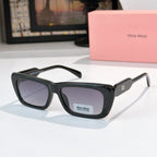 Black rectangular eyeglasses with dark lenses