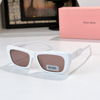 White rectangular eyeglasses with brown-tinted lenses