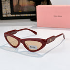 MiuMiu cat-eye glasses with red frame and brown tint lenses