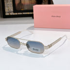 Gold-frame round sunglasses with blue lenses and light tortoise-style temples