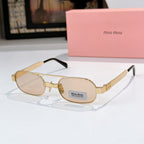 Gold-frame round sunglasses with amber lenses and tortoise-style temples