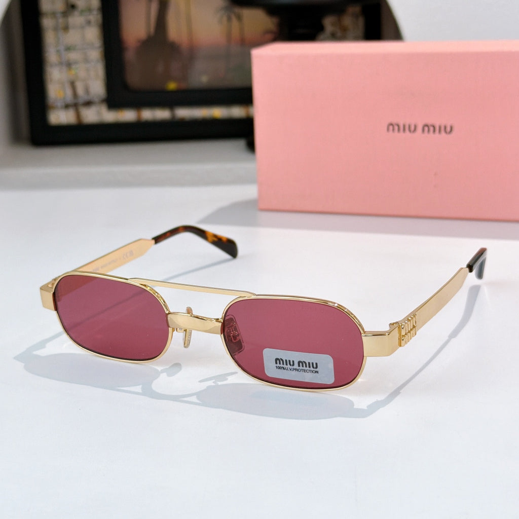 Gold-frame round sunglasses with magenta lenses and tortoise-style temples
