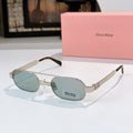 Gold-frame round sunglasses with light blue lenses and dark tortoise temples