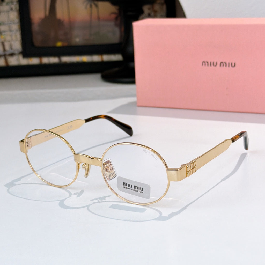 Round sunglasses with gold-tone frame and light pink tinted lenses