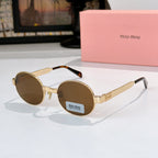 Round sunglasses with gold-tone frame and brown tinted lenses