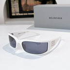 Balenciaga sunglasses with white frame and blue tinted lenses.
