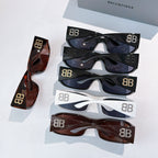 Balenciaga sunglasses set showing multiple frame colors with tinted lenses.