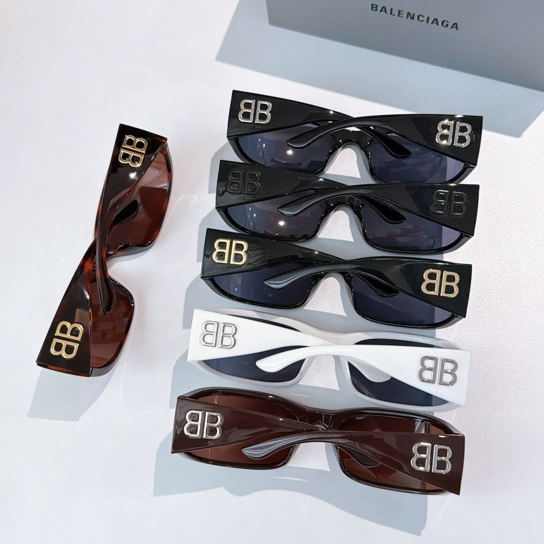 Balenciaga sunglasses set showing multiple frame colors with tinted lenses.