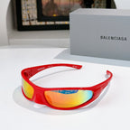 Balenciaga sunglasses with red frames and multicolor gradient lenses, sporty wrap fit.