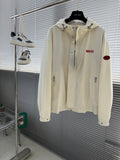 Cream Gucci hooded jacket with front zipper and red Gucci logo