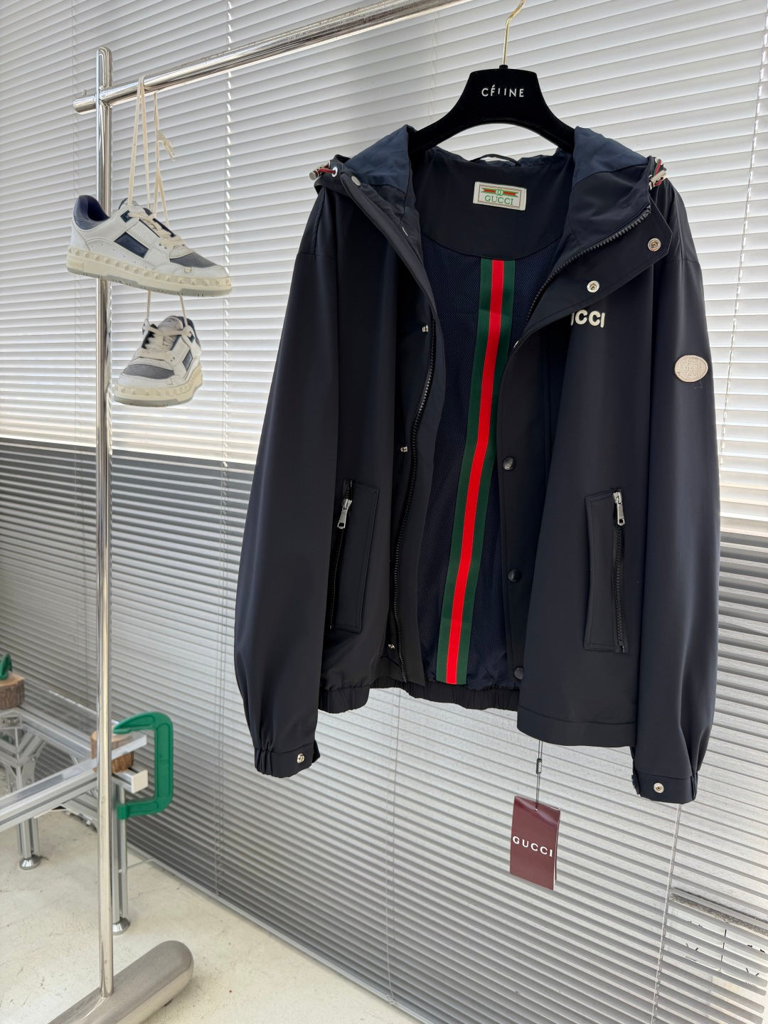 Gucci hooded jacket with colorful stripe lining, front zip and flap pockets