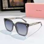 MiuMiu sunglasses with dark gray frame and dark blue square lenses