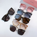 MiuMiu sunglasses set with multiple frames and tinted lenses