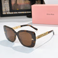 Dark tortoiseshell square sunglasses with brown lenses and gold logo temple detail