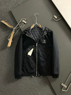 Black bomber-style jacket with full front zipper and small Fendi logo patch