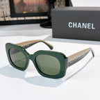 Chanel sunglasses with dark green frames and green gradient lenses, studded logo temples