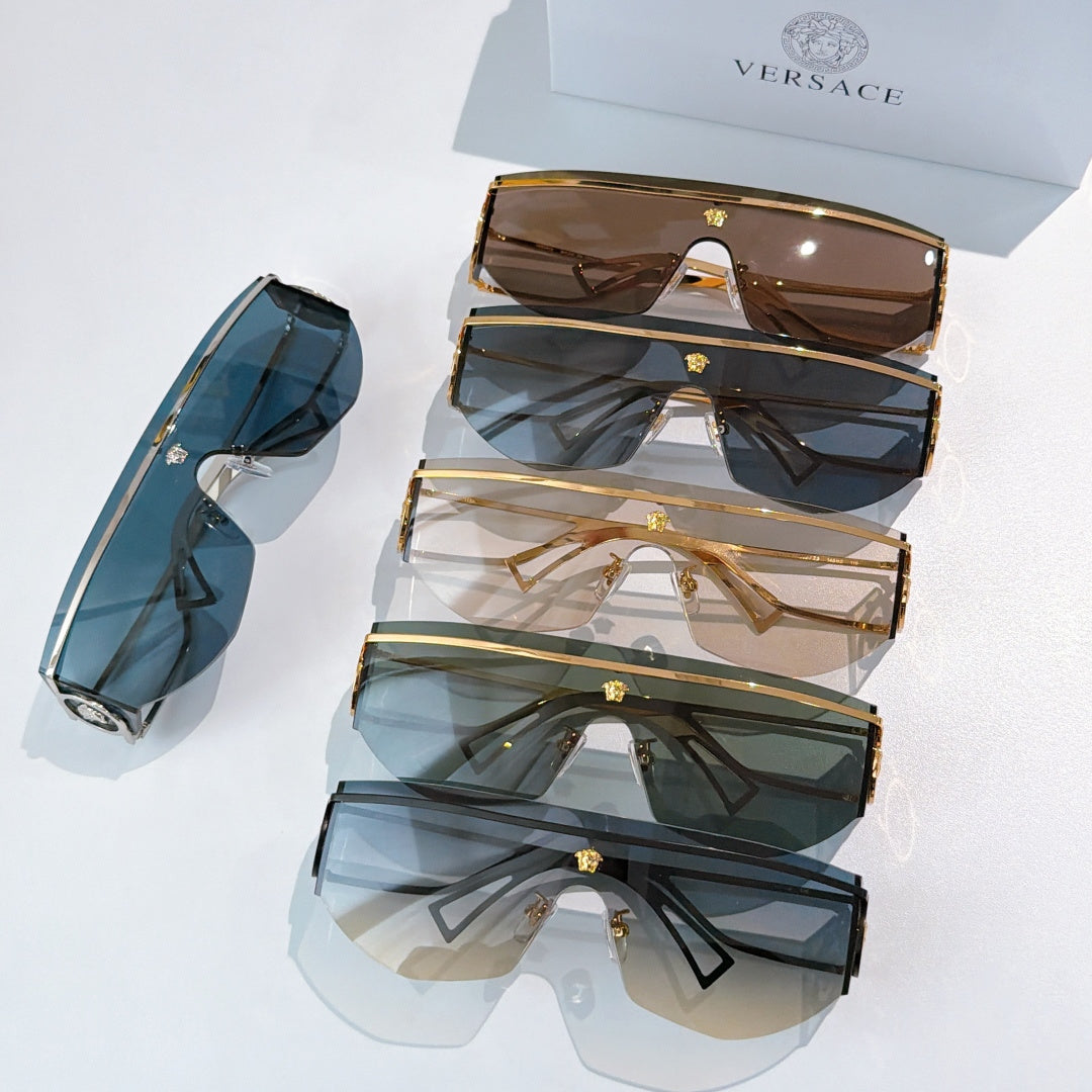 Multiple pairs of sunglasses with dark lenses, stacked on display