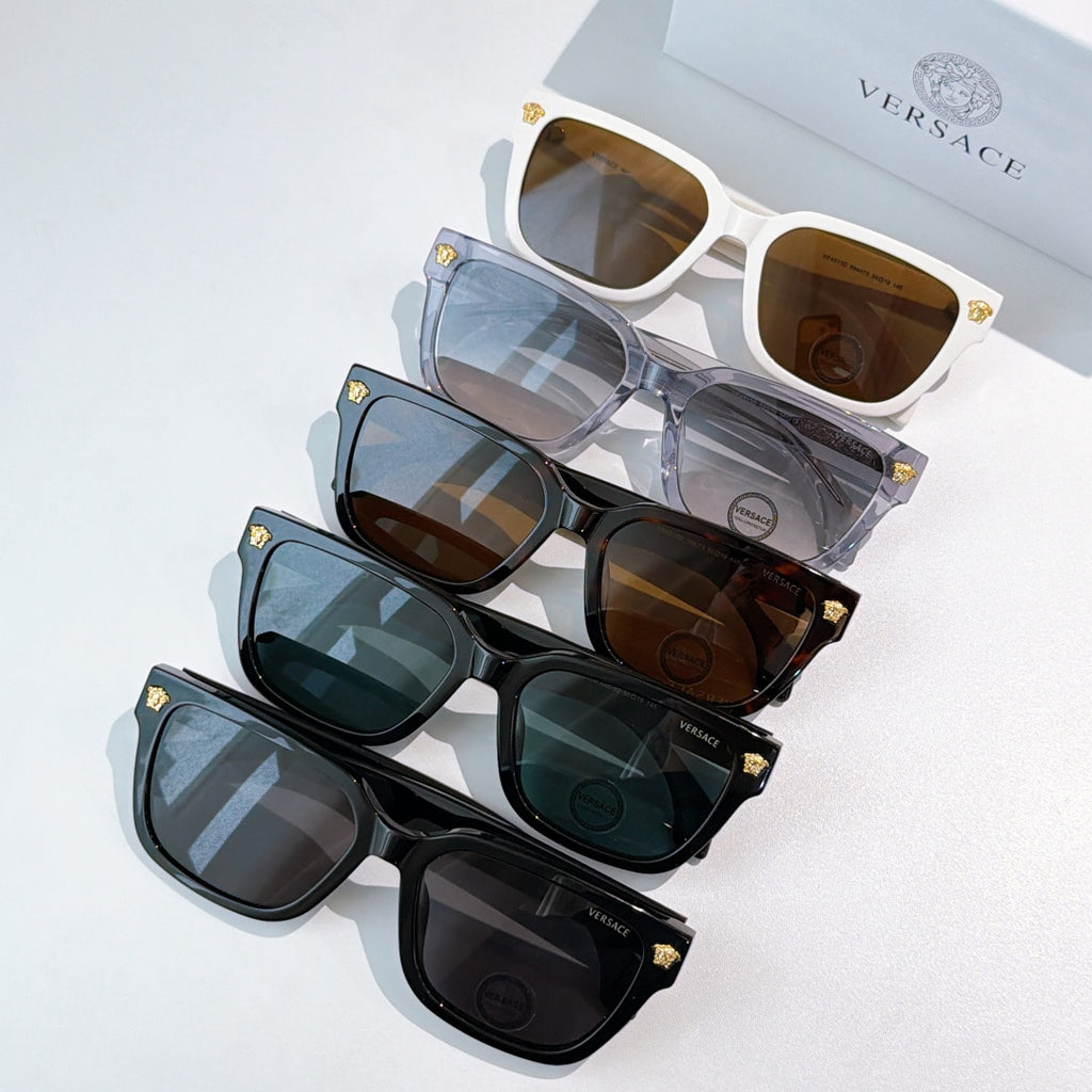 Set of four sunglasses with assorted frames and tinted lenses