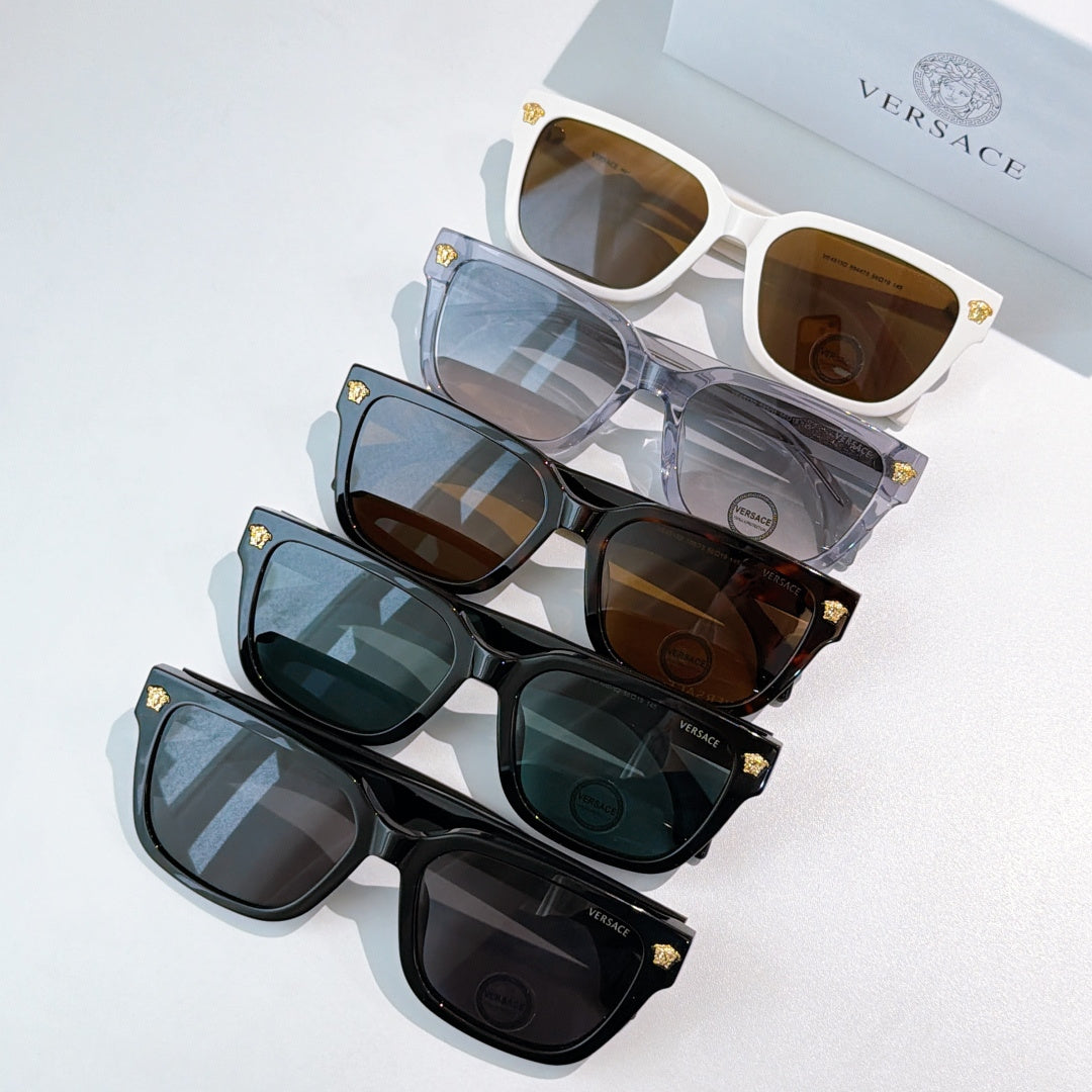Set of four sunglasses with assorted frames and tinted lenses