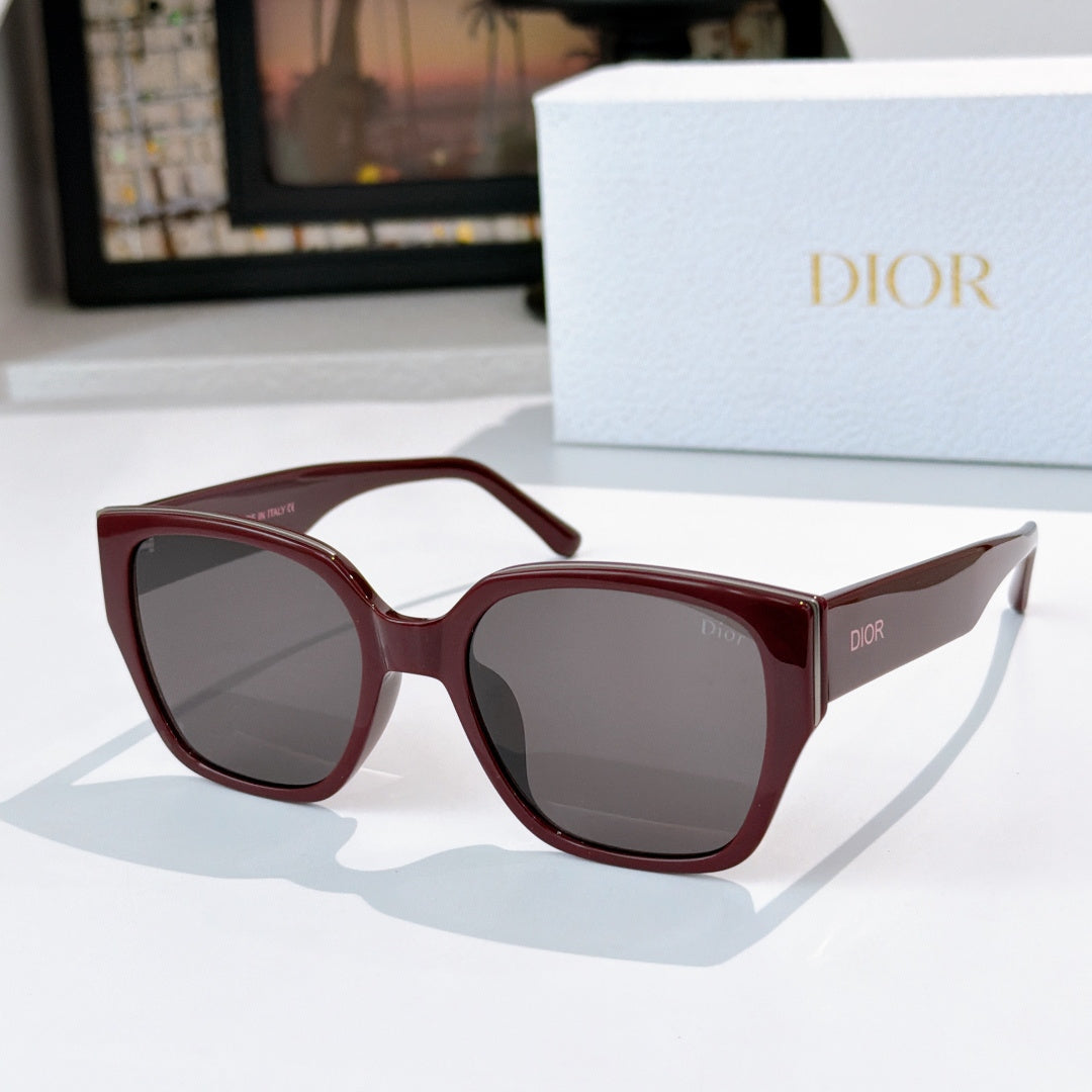 Dior sunglasses with burgundy frames and gray tinted lenses