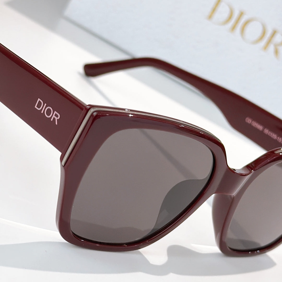 Dior sunglasses side view with burgundy frames and gray tinted lenses