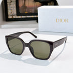 Dior sunglasses with dark brown frames and olive-green tinted lenses