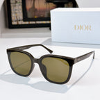Sunglasses with black acetate frame and olive-tinted lenses