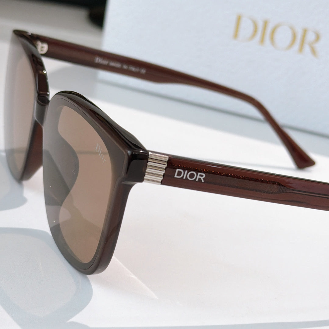 Tortoiseshell sunglasses with tinted lenses, shown from the side